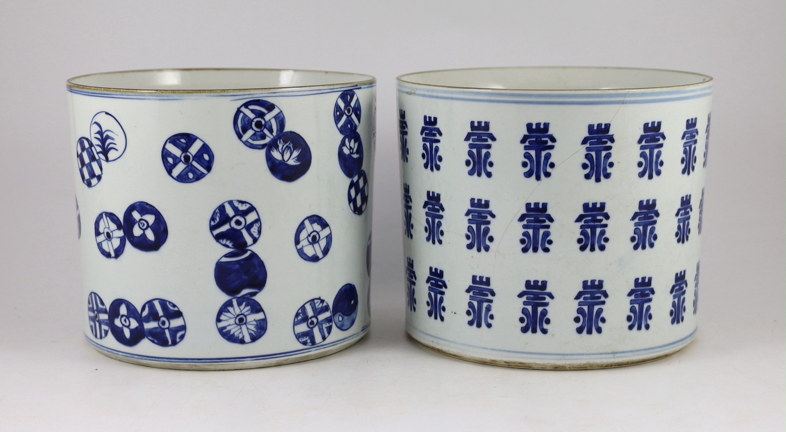 A pair of large Chinese blue and white brushpots, late 19th century 25 cm diameter, one cracked